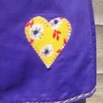 Girls purple pinafore heart..