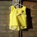 Girls yellow sleeveless top..