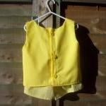 Girls yellow sleeveless top..