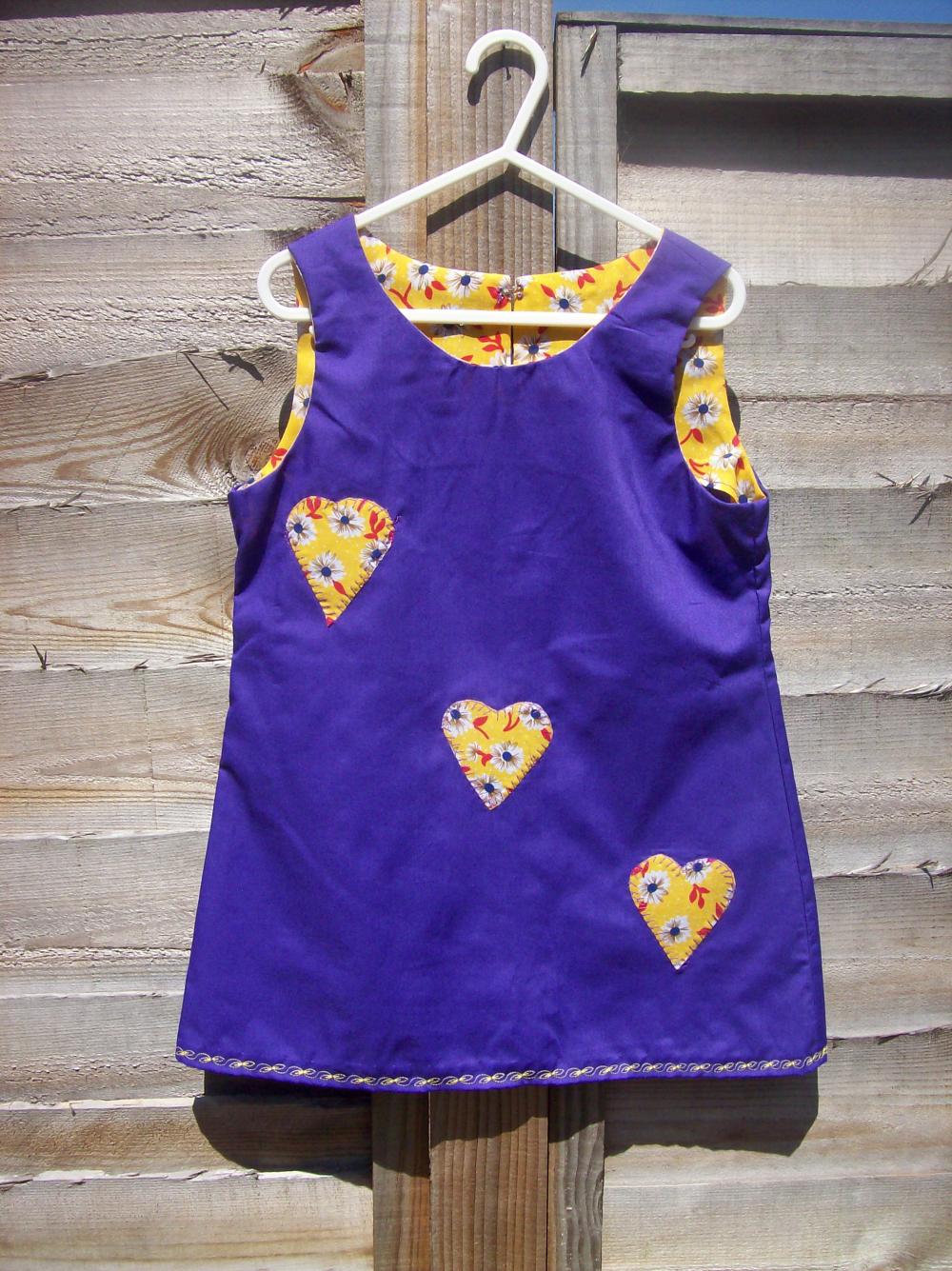 Girls purple pinafore heart applique pinafore dress