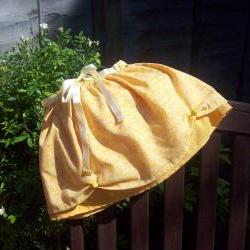 Baby girls orange floral skirt and knicker/pant set